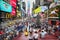 New York, USA â€“ August 24, 2018: Crowded with many people walking Times Square with huge number of LED signs, is a symbol of New