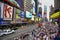 New York, USA â€“ August 24, 2018: Crowded with many people walking Times Square with huge number of LED signs, is a symbol of New