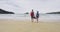 New Zealand beach travel vacation couple hiking on Onetahuti beach in Tonga Bay