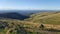 NEW ZEALAND, CHRISTCHURCH - OCTOBER 2016: A pair of unidentified couple mountain biking across Victoria hills of Christchurch New