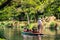 New Zealand, Christchurch, People are enjoing on the boat on the river in Botanic garden