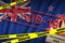 New Zealand flag and Covid-19 quarantine yellow tape with red stamp. Coronavirus or 2019-nCov virus