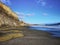 New Zealand Gemstone beach with high sandstone cliff