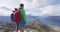 New Zealand hiking people on mountain top Roys Peak enjoying active lifestyle