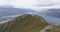 New Zealand hiking people on mountain top Roys Peak enjoying active lifestyle
