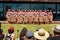 New Zealand Maori traditional dance performers in front of a crowd