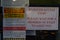 New Zealand, March 25 2020: Warning sign and instructions in shop window in response to Covid