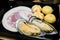 New zealand mussel, meat ball and kurobuta pork serve on plate.