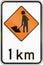 New Zealand road sign - Road workers ahead in 1 kilometre