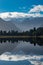 New Zealand\\\'s Southern Alps reflected in picturesque Lake Matheson