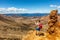 New Zealand Tongariro Alpine Crossing hike trail nature landscape hiker man taking picture of background. Happy tramper