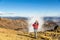New Zealand Tongariro Alpine Crossing Hiking trek hiker woman with bag and outdoor jacket tramping in volcanic steam