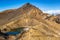 New Zealand Tongariro Alpine Crossing National Park. Tramping tramper hiker man walking on famous destination in NZ