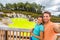 New Zealand tourist attraction couple tourists taking selfie travel destination, Waiotapu. Active geothermal green pond, Rotorua,