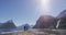 New Zealand - tourist couple hiking standing looking at Milford Sound