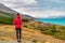 New Zealand travel - Tourist hiker on Road Trip looking at nature view of Lake Pukaki by Aoraki aka Mount Cook at Peters
