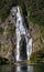 new zealand waterfall tall milford sound sunny