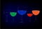 New2384_1684_artboardBeautiful glasses of colored drinks on blue background