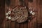 Newborn autumn background - wooden bowl with fall leaves and cream pumpkins on dark wooden planks backdrop