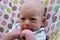 Newborn baby. Blonde boy with blue eyes, seven weeks.