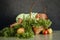 Newborn baby boy sleeping on grass in basket with apples fruits indoor. Cute and pretty. Home care and cozy. Motherhood