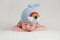 Newborn Baby Boy Wearing a Rainbow Hat