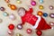 Newborn baby with Christmas tree decoarations and colorful toys and balls