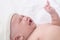 Newborn baby crying sick fever, get flu check up at clinic, Asian child infant 0-1month fussy screaming unhappy angry, hungry in