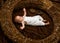 Newborn baby girl or boy. Newborn baby awake in crib. Newborn care routine. Early development. Child development and