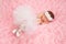 Newborn Baby Girl Wearing a White Ballerina Tutu