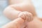 Newborn baby hold parents finger. Soft focus, blurred background. happy parenting and children infant innocence concept