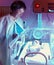 Newborn baby in incubator box, phototherapy