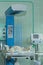Newborn baby on infant warmer in neonatal intensive care unit