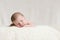 Newborn Baby Male Sleeping on Blanket