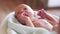 newborn. baby newborn a close-up lies looking at the camera in the hospital maternity hospital. happy family lifestyle