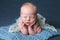 Newborn Baby Posed in a Froggy Pose