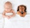 Newborn baby and puppy