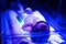 Newborn baby receiving phototherapy for jaundice