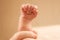 Newborn baby`s hand clenched into a fist