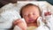 Newborn baby sleep. Boy infant sleep lies in a child bed. happy family birthday closeup baby concept. Cute baby close up