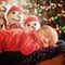 Newborn baby sleeping, Christmas tree and snowmen