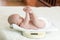 Newborn baby on weighing scale