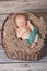 Newborn in a basket
