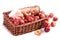 Newborn in the basket with apples