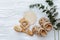 Newborn booties with empty card and wooden toys.