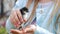 Newborn chicken in children hands. Baby chick on a human palm closeup, on blurred background.