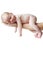 Newborn child on white, isolated.