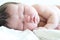 Newborn infant baby portrait close up first day life