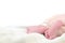Newborn infant foot on white background