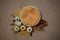 Newborn photography fall backgrund - white bowl with white and cream pumpkins, dry brown leaves on beige backdrop